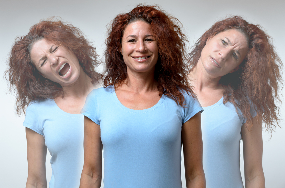 front-view-on-three-versions-of-woman-changing-from-moods-of-anger-joy-and-confusion