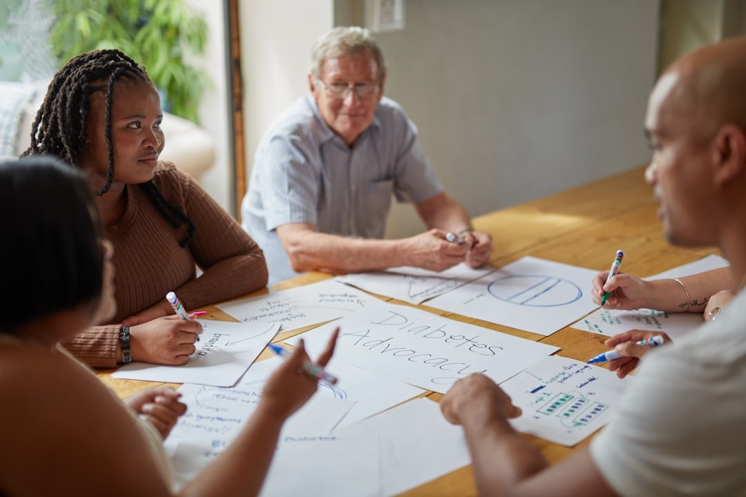 People are working together at a meeting.